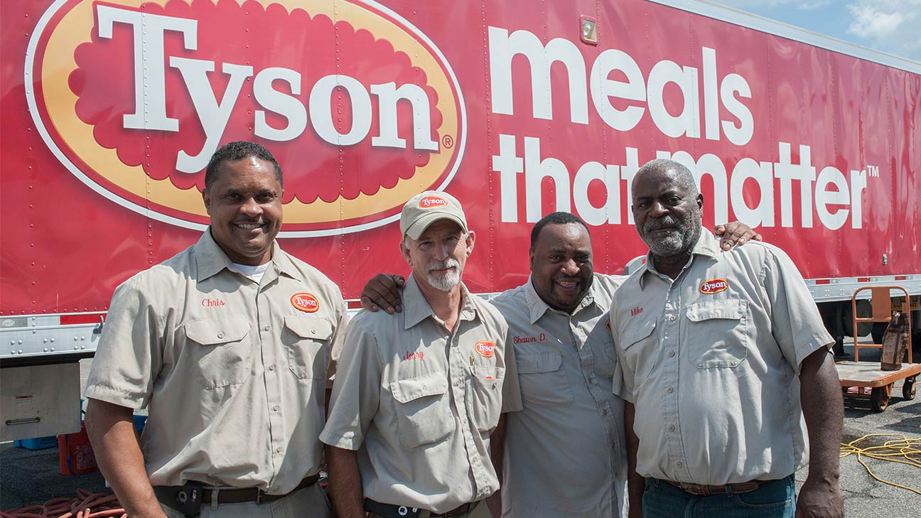 Tyson Employees In Front of Truck